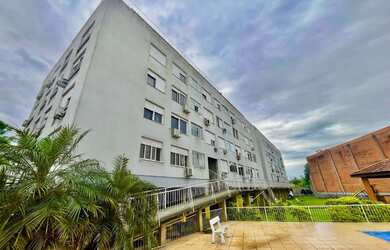 Imagem: O apartamento possui 3 Dormitórios, 1 Banheiro, 1 Vaga na garagem