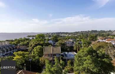 Imagem: A casa possui 5 Dormitórios, 5 Banheiros, 2 Vagas na garagem