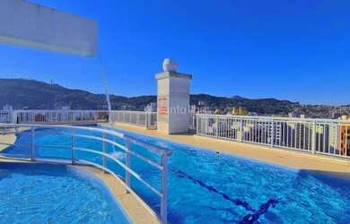 Imagem: O apartamento possui 3 Dormitórios, 2 Banheiros, 2 Vagas na