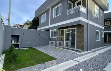 Imagem: A casa possui 2 Dormitórios, 3 Banheiros, 1 Vaga na garagem