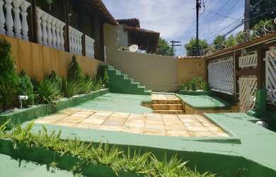 Imagem: A casa possui 4 Dormitórios, 3 Banheiros, 3 Vagas na garagem