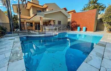 Imagem: A casa em condomínio possui 4 Dormitórios, 5 Banheiros, 4