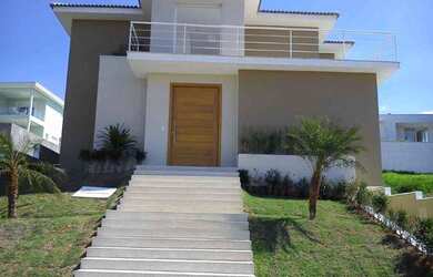 Imagem: A casa em condomínio possui 5 Dormitórios, 5 Banheiros, 3