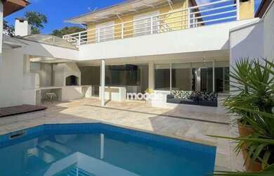 Imagem: A casa em condomínio possui 4 Dormitórios, 4 Banheiros, 2