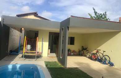 Imagem: A casa possui 2 Dormitórios, 2 Banheiros, 3 Vagas na garagem