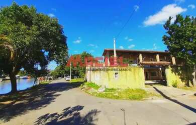 Imagem: A casa possui 5 Dormitórios, 1 Banheiro, 5 Vagas na garagem