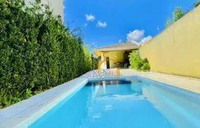 Imagem: A casa possui 3 Dormitórios, 4 Banheiros, 2 Vagas na garagem