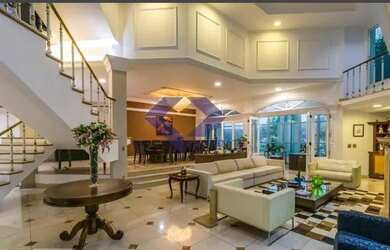 Imagem: A casa possui 5 Dormitórios, 5 Banheiros, 5 Vagas na garagem