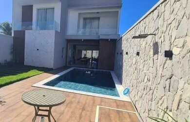 Imagem: A casa em condomínio possui 5 Dormitórios, 5 Banheiros, 2