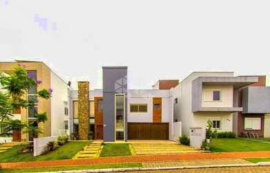 Imagem: A casa possui 3 Dormitórios, 3 Banheiros, 2 Vagas na garagem