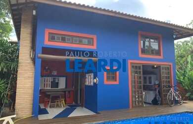 Imagem: A casa possui 4 Dormitórios, 4 Banheiros, 2 Vagas na garagem