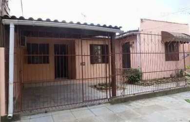 Imagem: A casa possui 3 Dormitórios, 2 Banheiros, 1 Vaga na garagem