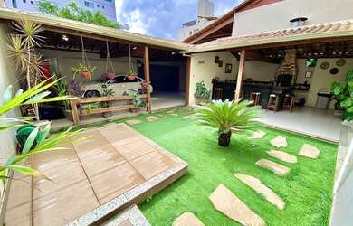 Imagem: A casa possui 3 Dormitórios, 4 Banheiros, 4 Vagas na garagem