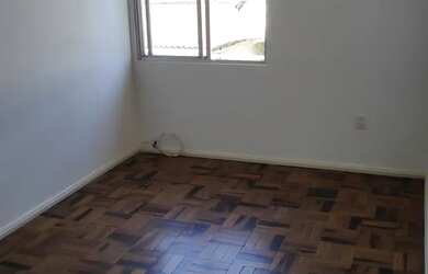 Imagem: O apartamento possui 1 Dormitório, 1 Banheiro, 1 Vaga na garagem