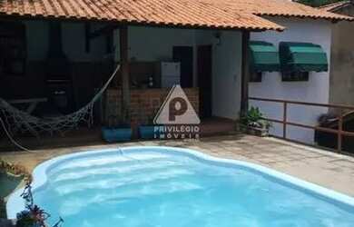 Imagem: A casa possui 5 Dormitórios, 5 Banheiros, 5 Vagas na garagem