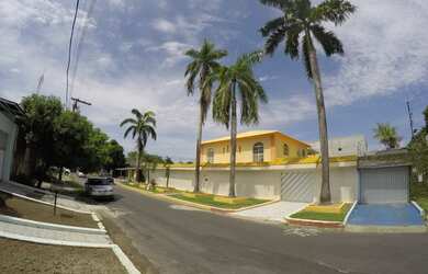 Imagem: A casa possui 5 Dormitórios, 5 Banheiros, 5 Vagas na garagem