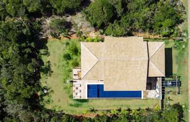 Imagem: A casa possui 5 Dormitórios, 5 Banheiros, 5 Vagas na garagem