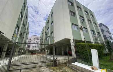 Imagem: O apartamento possui 3 Dormitórios, 1 Banheiro, 1 Vaga na garagem