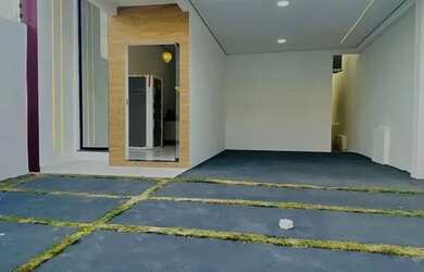 Imagem: A casa possui 3 Dormitórios, 2 Banheiros, 3 Vagas na garagem