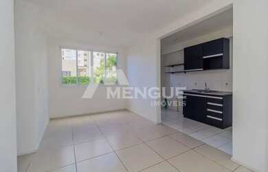 Imagem: O apartamento possui 3 Dormitórios, 1 Banheiro, 1 Vaga na garagem