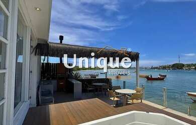 Imagem: A casa possui 5 Dormitórios, 5 Banheiros, 3 Vagas na garagem