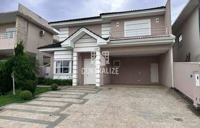 Imagem: A casa em condomínio possui 1 Dormitório, 4 Banheiros, 2 Vagas