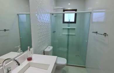 Imagem: A casa possui 5 Dormitórios, 5 Banheiros, 5 Vagas na garagem