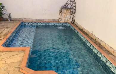 Imagem: A casa possui 4 Dormitórios, 4 Banheiros, 3 Vagas na garagem