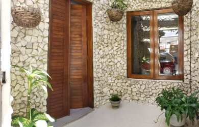 Imagem: A casa para temporada possui 2 Dormitórios e 1 Vaga na garagem