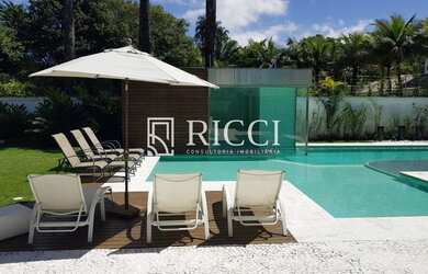 Imagem 2: CASAGUARUJÁ. Piscina, Churrasqueira, Ar-condicionadoeLareira