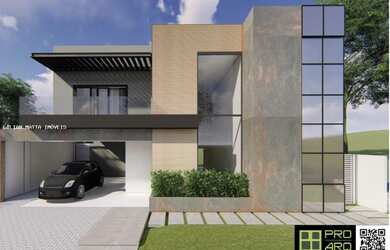 Imagem: A casa possui 4 Dormitórios, 5 Banheiros, 4 Vagas na garagem