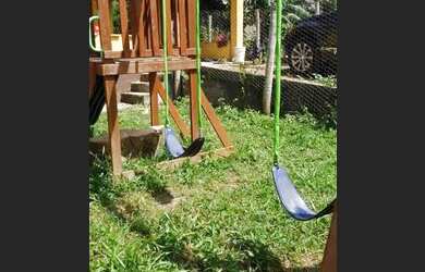 Imagem: A casa possui 5 Dormitórios e 4 Vagas na garagem e está localizado