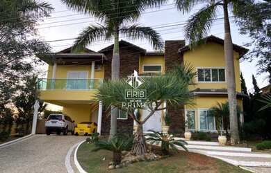 Imagem: A casa em condomínio possui 4 Dormitórios, 4 Banheiros, 4