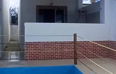 Imagem 8: Casa de temporada. Churrasqueira, Varanda, 1 Vaga na garageme1 Dormitório