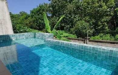 Imagem: A casa em condomínio possui 4 Dormitórios, 5 Banheiros, 280m²