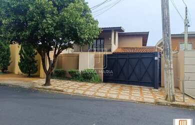 Imagem: A casa possui 3 Dormitórios, 5 Banheiros, 4 Vagas na garagem