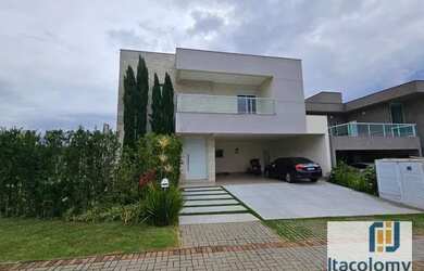 Imagem: A casa em condomínio possui 5 Dormitórios, 5 Banheiros, 3