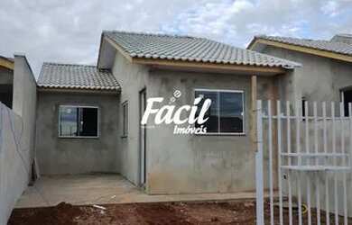 Imagem: A casa possui 2 Dormitórios, 1 Banheiro, 2 Vagas na garagem