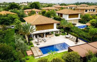 Imagem: A casa em condomínio possui 5 Dormitórios, 2 Banheiros, 4