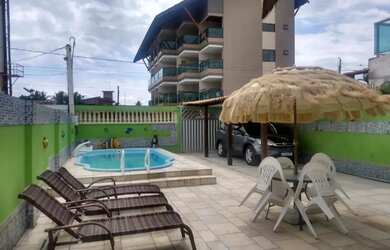 Imagem: A casa possui 3 Dormitórios, 3 Banheiros, 2 Vagas na garagem