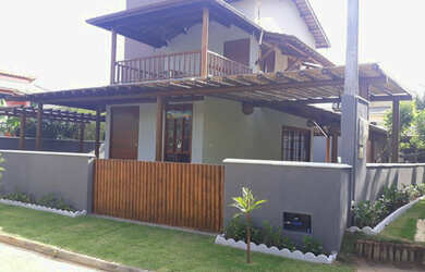 Imagem: A casa possui 3 Dormitórios, 4 Vagas na garagem e está localizado