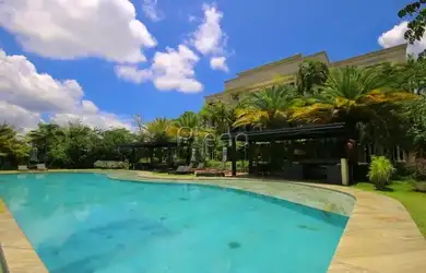 Imagem: A casa possui 5 Dormitórios, 4 Banheiros, 5 Vagas na garagem