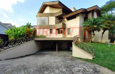 Imagem: A casa possui 5 Dormitórios, 5 Banheiros, 4 Vagas na garagem