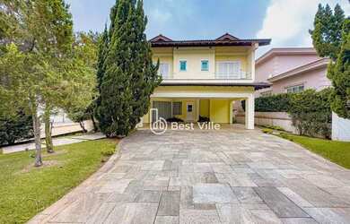 Imagem: A casa em condomínio possui 5 Dormitórios, 5 Banheiros, 4