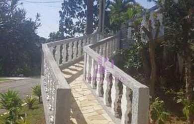 Imagem: A casa em condomínio possui 5 Dormitórios, 5 Banheiros, 2