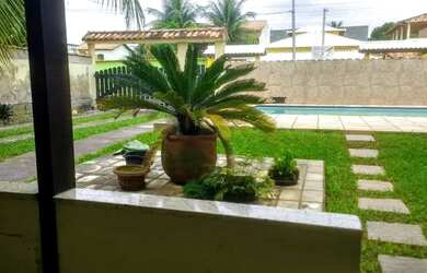 Imagem: A casa possui 5 Dormitórios, 3 Vagas na garagem e está localizado