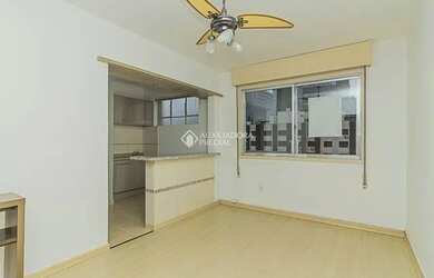 Imagem: O apartamento possui 1 Dormitório, 1 Banheiro, 1 Vaga na garagem