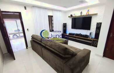 Imagem: A casa possui 3 Dormitórios, 3 Banheiros, 2 Vagas na garagem