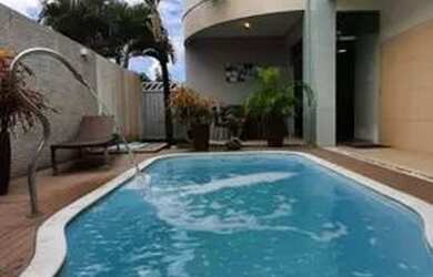 Imagem: A casa em condomínio possui 4 Dormitórios, 4 Banheiros, 2