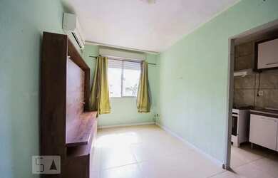 Imagem: O apartamento possui 1 Dormitório, 1 Banheiro, 1 Vaga na garagem